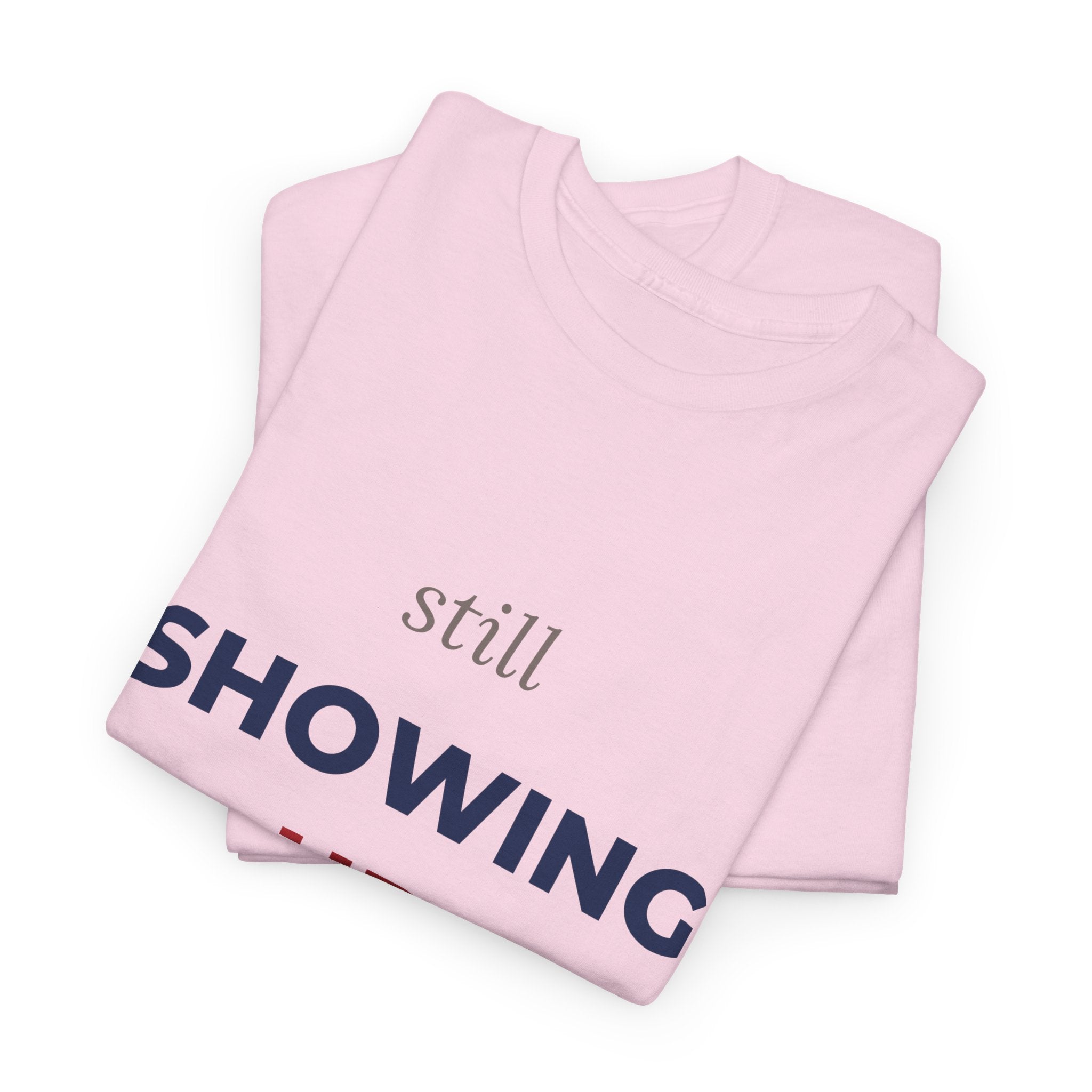 Still Showing Up Red and Blue Edition T-Shirt in Light Pink — worn with zero apologies — ThrivingMoms